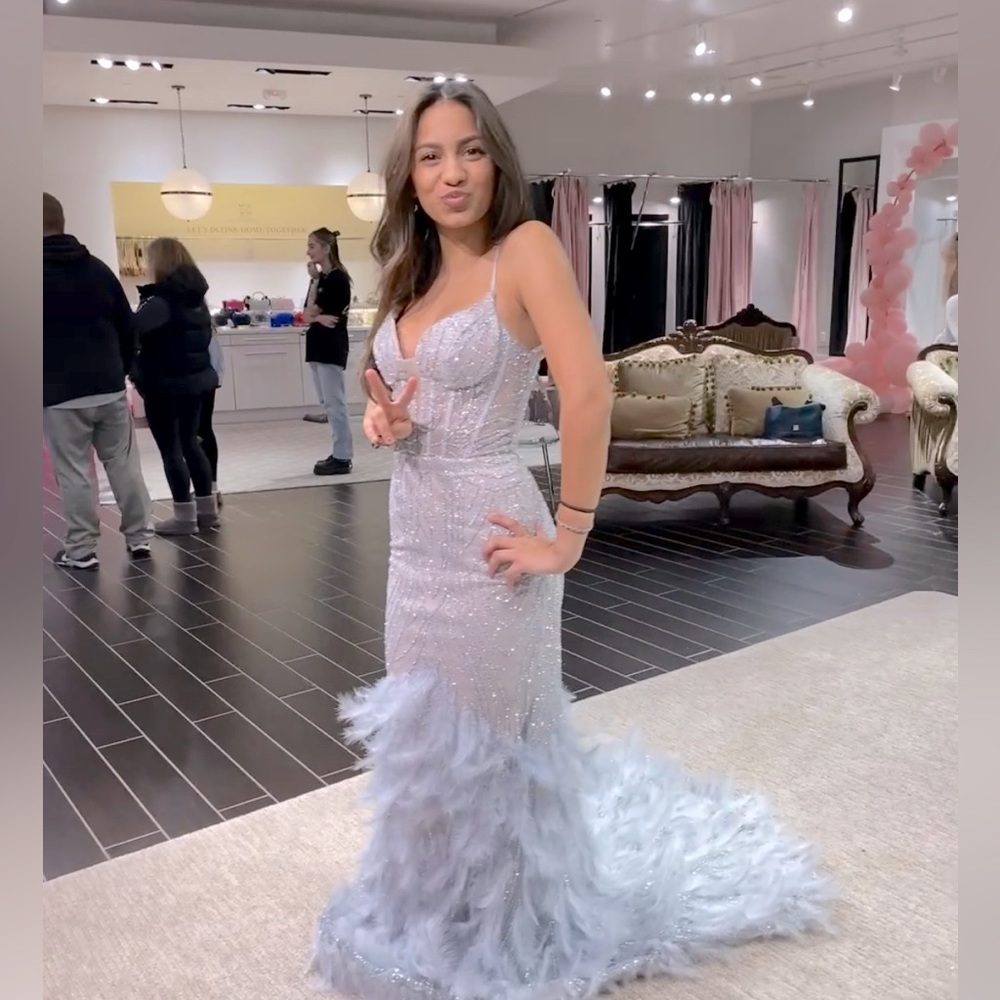 Silver prom dress with feathers